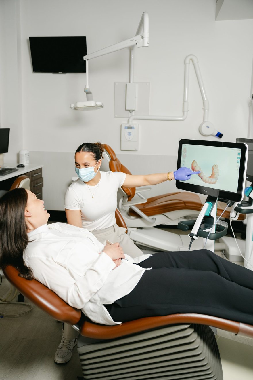 A Downtown Orthodontics clinician scanning a patient chairside